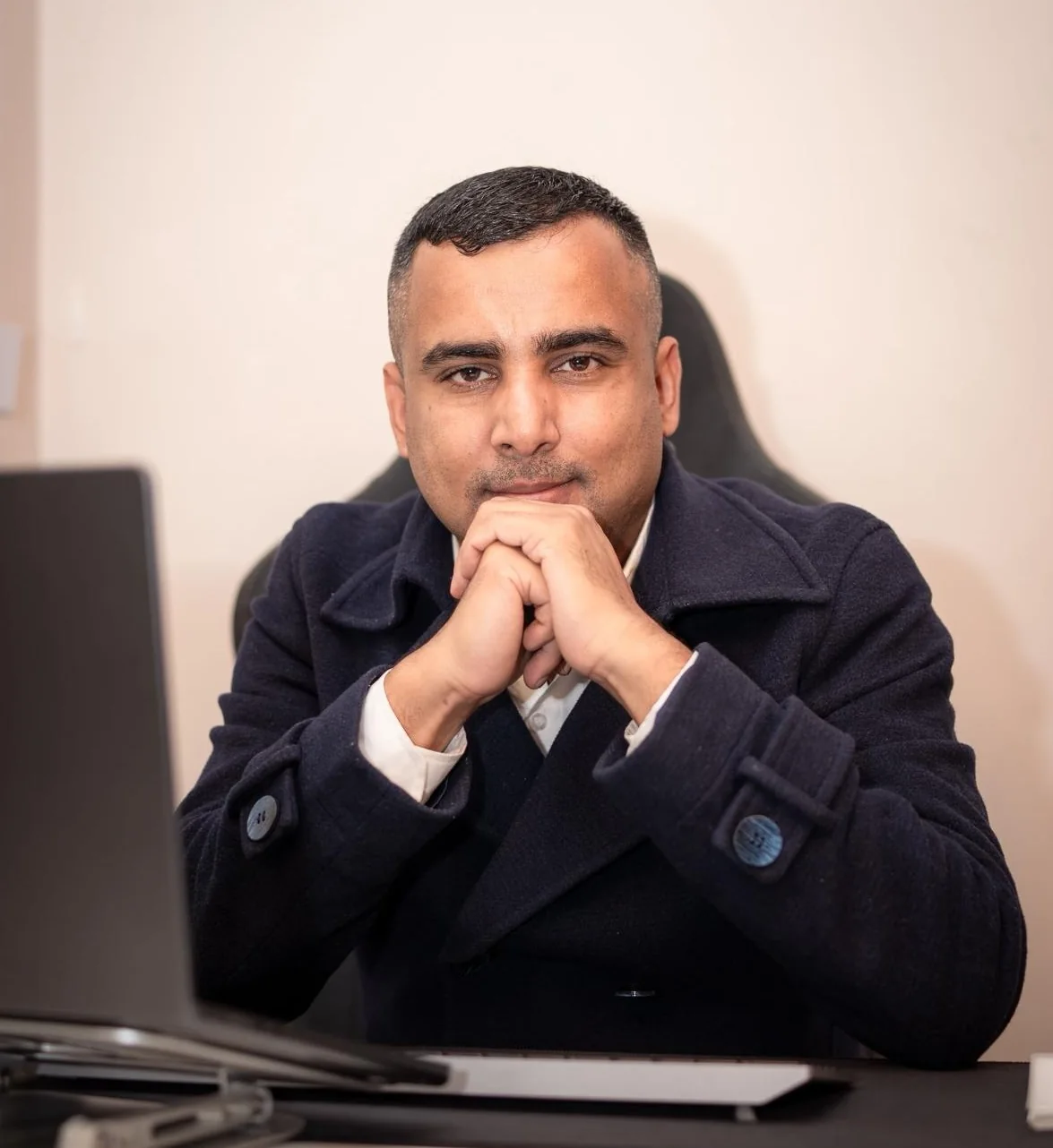 Gorakh Timilsina, founder of GNT Finance, at his desk in Mickleham